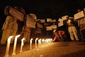 A candlelight vigil for a gang rape victim. Photo by Adnan Abidi/Reuters.