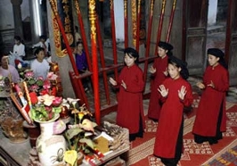 Singers perform 'hat xoan,' a traditional style of ritual folk singing sung during spring festivals 
