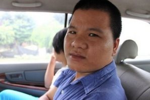 Blue Dragon lawyer Ta Ngoc Van with young trafficking survivor