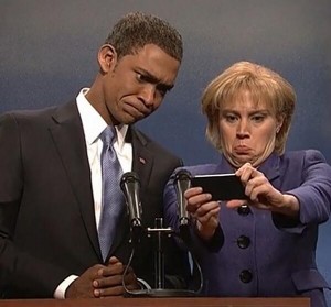 SNL's versions of Obama and Merkel take selfies. 