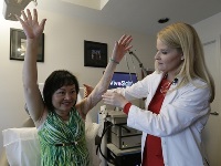 Kim Phuc is examined by Dr. Waibel
