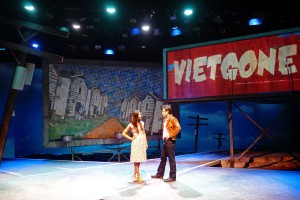 Maureen Sebastian as Tong and Raymond Lee as Quang, against the comic book-esque set of Vietgone. Photo courtesy of South Coast Repertory.
