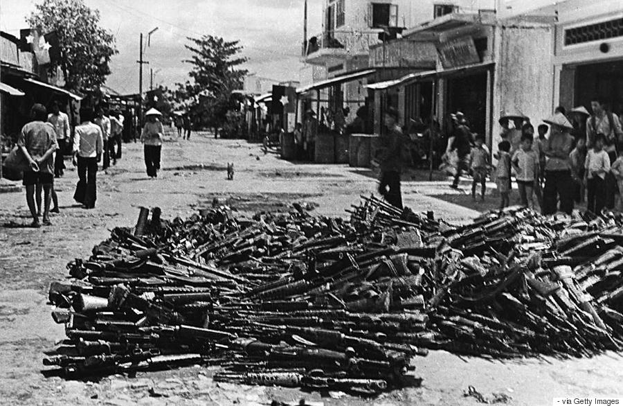 (VIETNAM-25, 1/3) A 01 May 1975 photo shows a large pile of US-made rifles abandoned by pro-American Southern Vietnamese army soldiers collected at Nhan Nghia commune, Chau Thanh district, in the southern province of Can Tho one day after Saigon fell to communist troops. Few young Vietnamese express much interest in the war, even though it scarred the lives of the parents and grandparents. AFP PHOTO (Photo credit should read -/AFP/Getty Images)