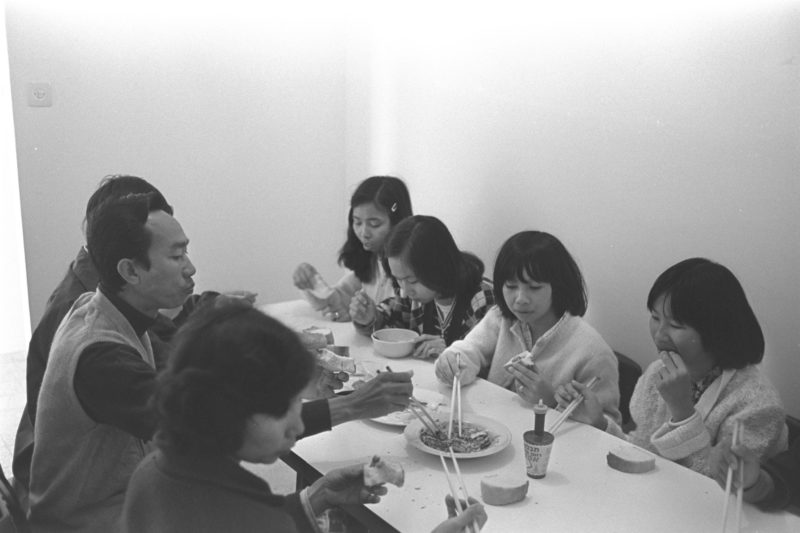 Header image. A Vietnamese refugee family has lunch at the Absorption Center in Afula, Israel.